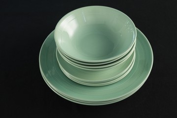 Dining plates set on black theme table