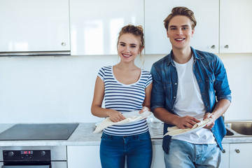 Couple is doing cleaning at home