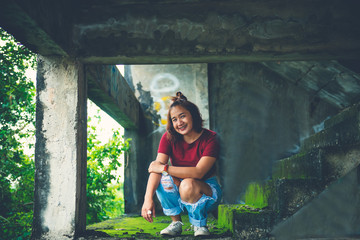 Hipster asian fat woman sit on the floor pose for take a picture vintage style,thailand people
