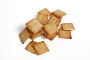 salty crackers on a white background