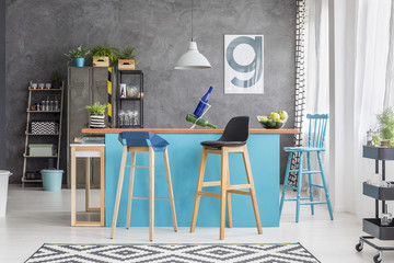 Wooden bar stools at table