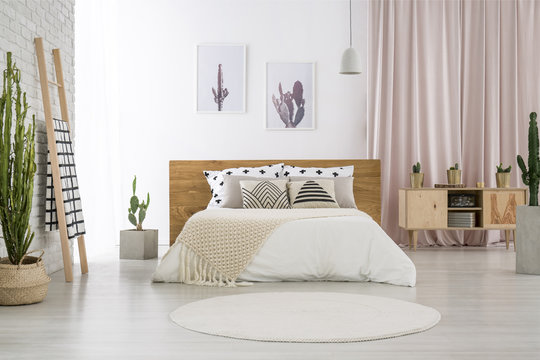 Bright bedroom with cactus motif