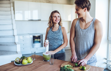 Sporty couple with healthy food