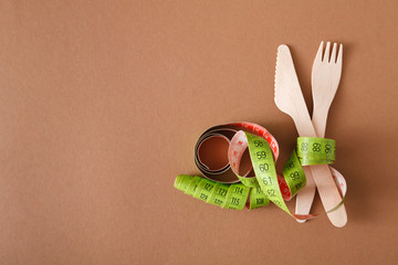 Tape measure wrapped around knife and fork
