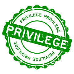 Grunge green privilege round rubber seal stamp on white background