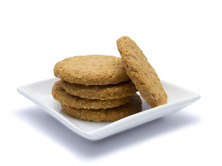 Nut cookies on a saucer.