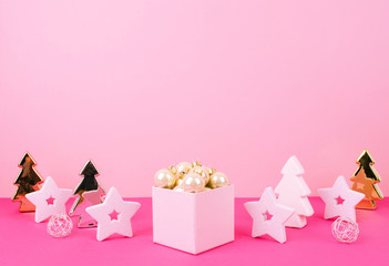Christmas tree balls on a pink background