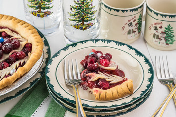 Homemade Christmas cranberry pie on table served for Christmas party.