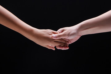 Closeup human hand touch together.