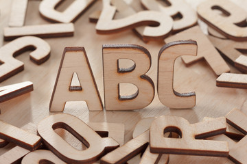 Back to school concept. Alphabet made of wooden letters