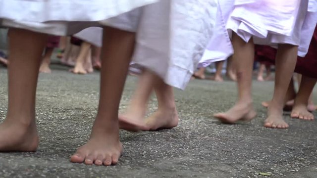 Burmese Nuns Walk. Feet Close Up shot with a Sony a6300 fps29,97 4k