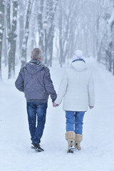 senior couple  walking outdoors