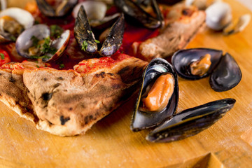 Sea pizza with mussels and clams