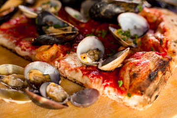 Fototapeta na wymiar Sea pizza with mussels and clams