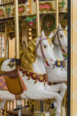 City colorful traditional french carousel for children, horse for riding