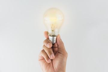 business hand holding lightbulb. concept for new ideas with innovation and creativity.
