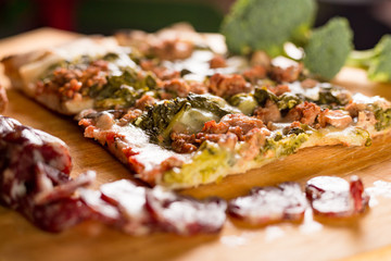 Pizza with broccoli and sausage