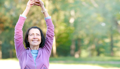 Portrait of mature woman before or after jog in the park