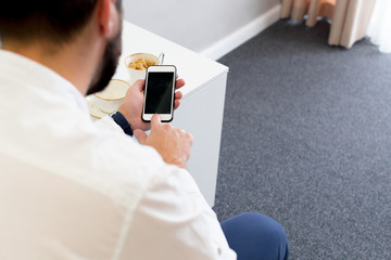 Mature businessman in a hotel room