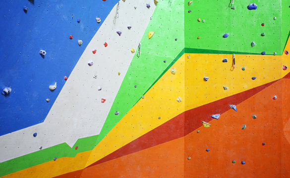 Climbing wall with artificial boulders