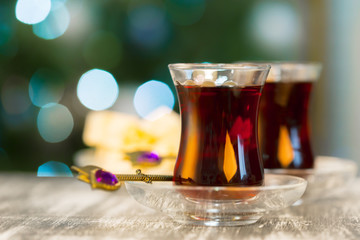 Christmas hot  tea, and light bokeh