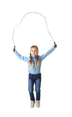 Cute little girl playing with jumping rope on white background