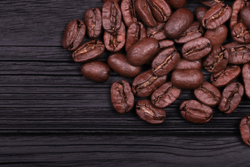  cracked grains of black fried coffee