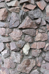 Rubble gray and brown stone wall, rubble work