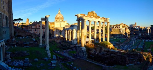 Obraz na płótnie Canvas View of the Roman Forum at sunrise or sunset
