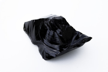 Obsidian mineral isolated over white