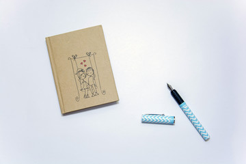 notepad and fountain pen