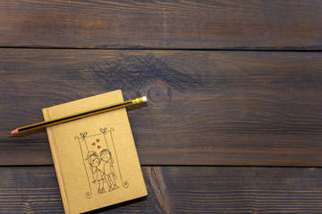 notebook on a wooden table