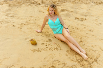 exotic vacation. Dominican republic written on the sand