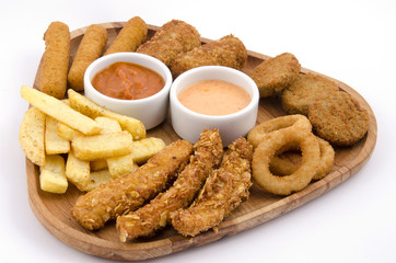 mixed snack fries on wood board