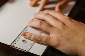 Close up of woman hand holding ruler
