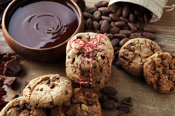 Chocolate cookies on wooden table. Chocolate chip cookies.