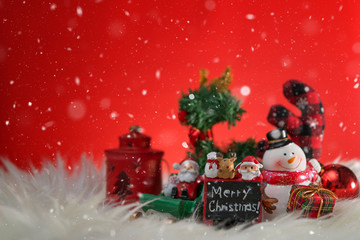 Christmas holiday background with Santa and decorations. Christmas landscape with gifts and snow. Merry christmas and happy new year greeting card with copy-space. 