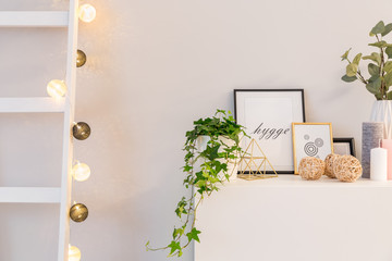 White cabinet and ladder
