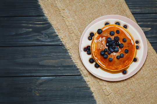pancakes with honey and blueberries