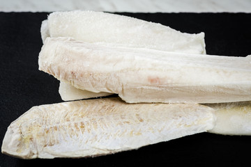 frozen fish on stone plate
