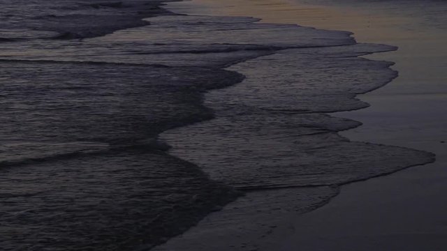 Wave in sunset. Close up