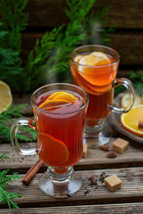 Hot fruit tea with orange, apple, lemon, raisin and spices