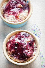 Rice pudding with blueberry sauce 