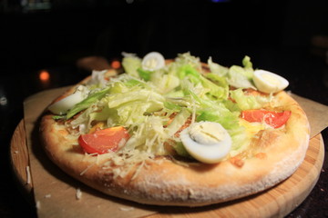 pizza caesar with lettuce