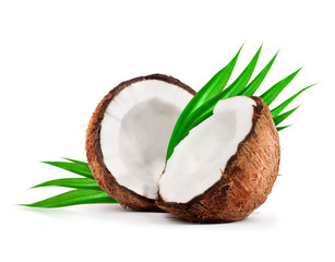 Coconut with leaves close-up, isolated on a white background