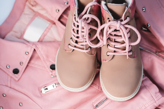 Kid's pink set of clothes and footwear
