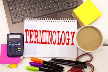 Word writing Terminology in the office with  laptop, marker, pen, stationery, coffee. Business concept for Medical Legalistic Terminological Workshop white background with copy space