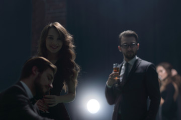 two glamorous couples, have fun in the casino