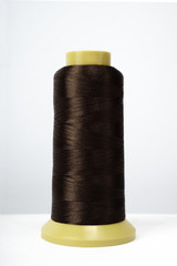 Spool of thread isolated on white background