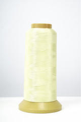 Spool of thread isolated on white background